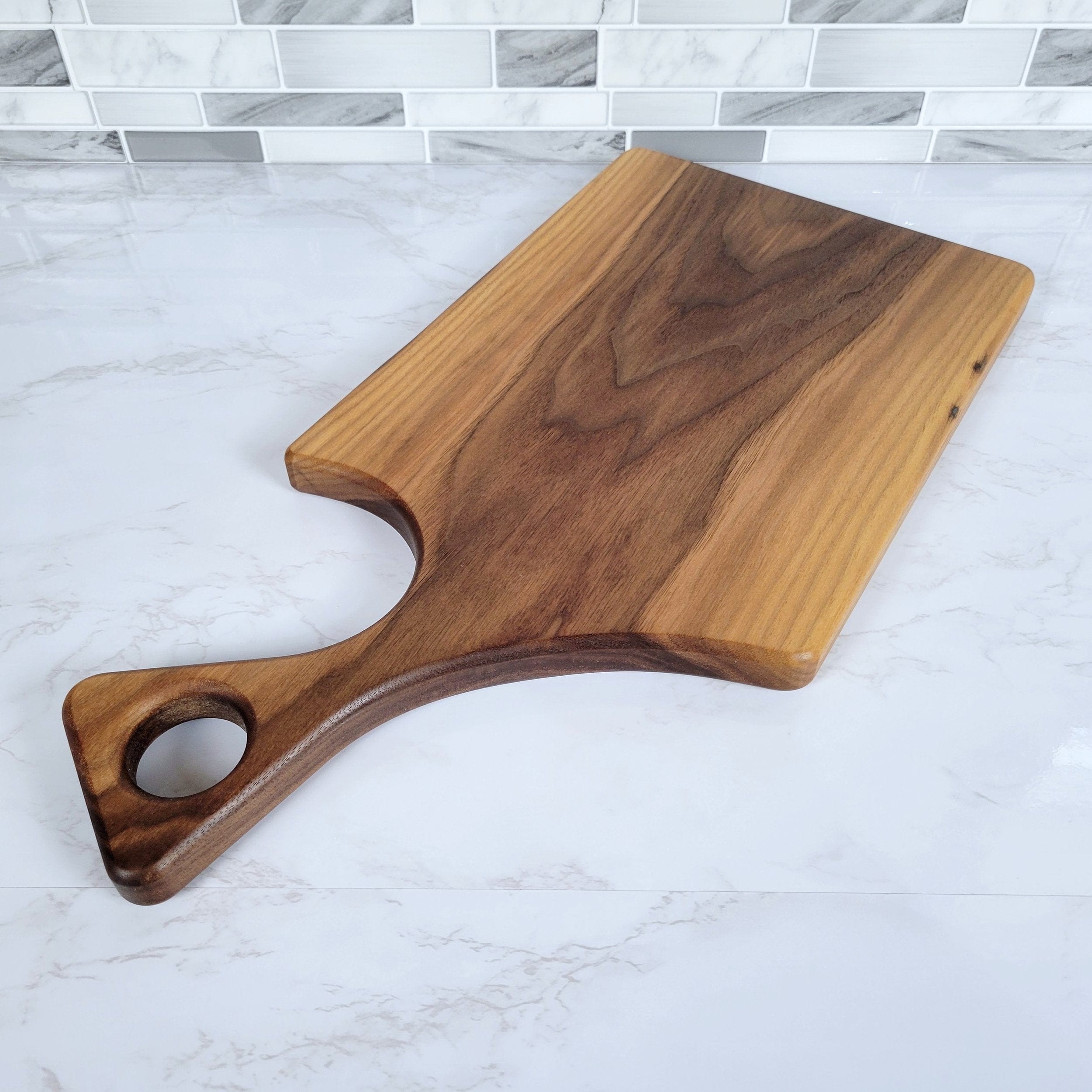 Wood Grain Junkie Black Walnut Charcuterie Board with a Modern Handle