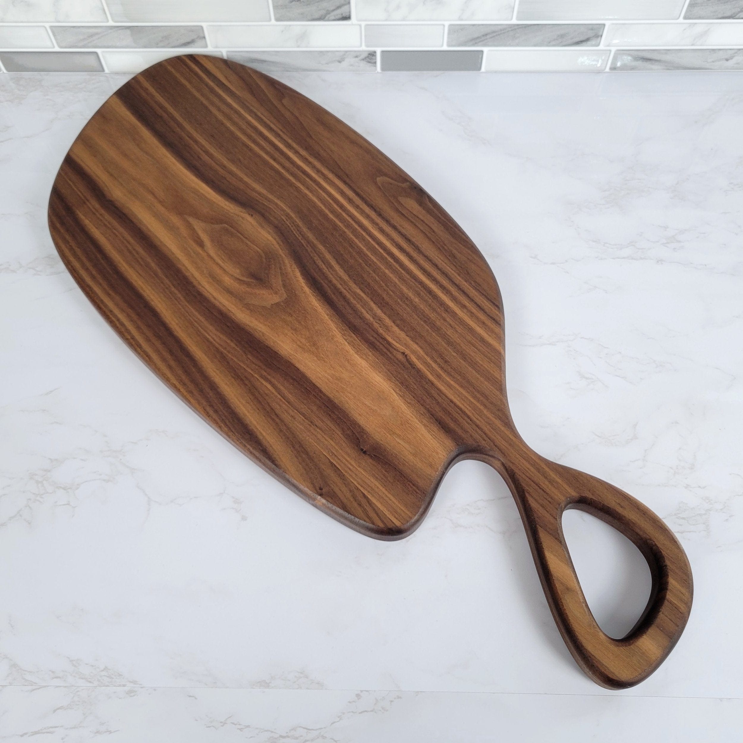 Wood Grain Junkie Black Walnut Charcuterie Board with Organic Curves and Handle