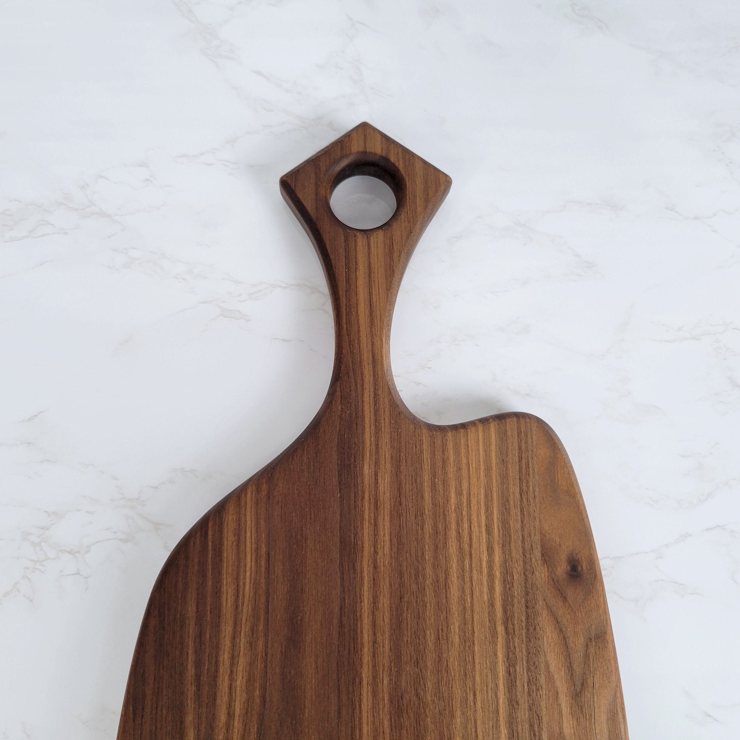 Wood Grain Junkie Black Walnut Charcuterie Board with Organic Curves and Modern Handle