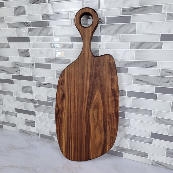Wood Grain Junkie Black Walnut Charcuterie Board with Organic Curves and Round Handle