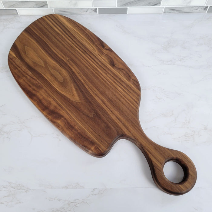 Wood Grain Junkie Black Walnut Charcuterie Board with Organic Curves and Round Handle