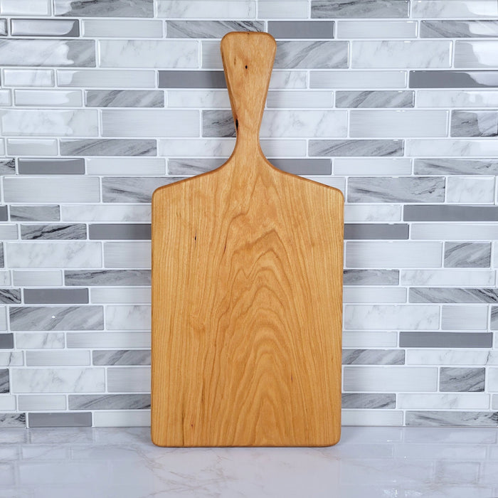 Wood Grain Junkie Cherry Charcuterie Board with a Sleek Modern Handle