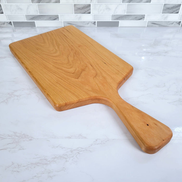 Wood Grain Junkie Cherry Charcuterie Board with a Sleek Modern Handle