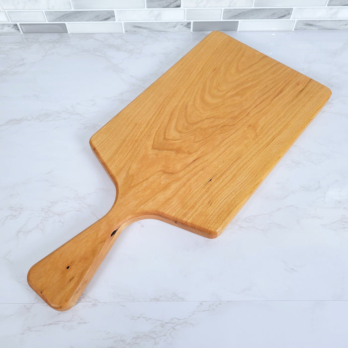 Wood Grain Junkie Cherry Charcuterie Board with a Sleek Modern Handle