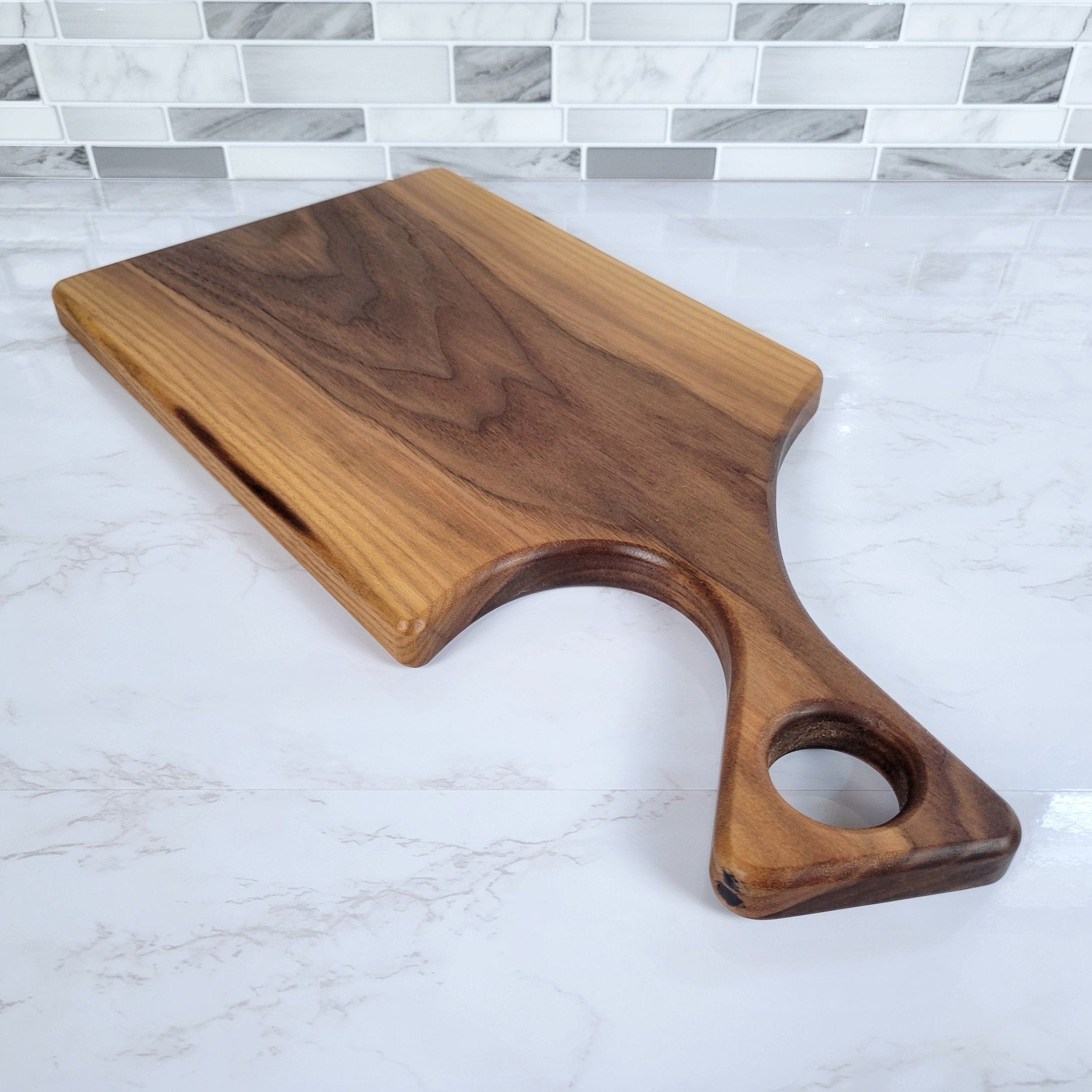Wood Grain Junkie Black Walnut Charcuterie Board with a Modern Handle