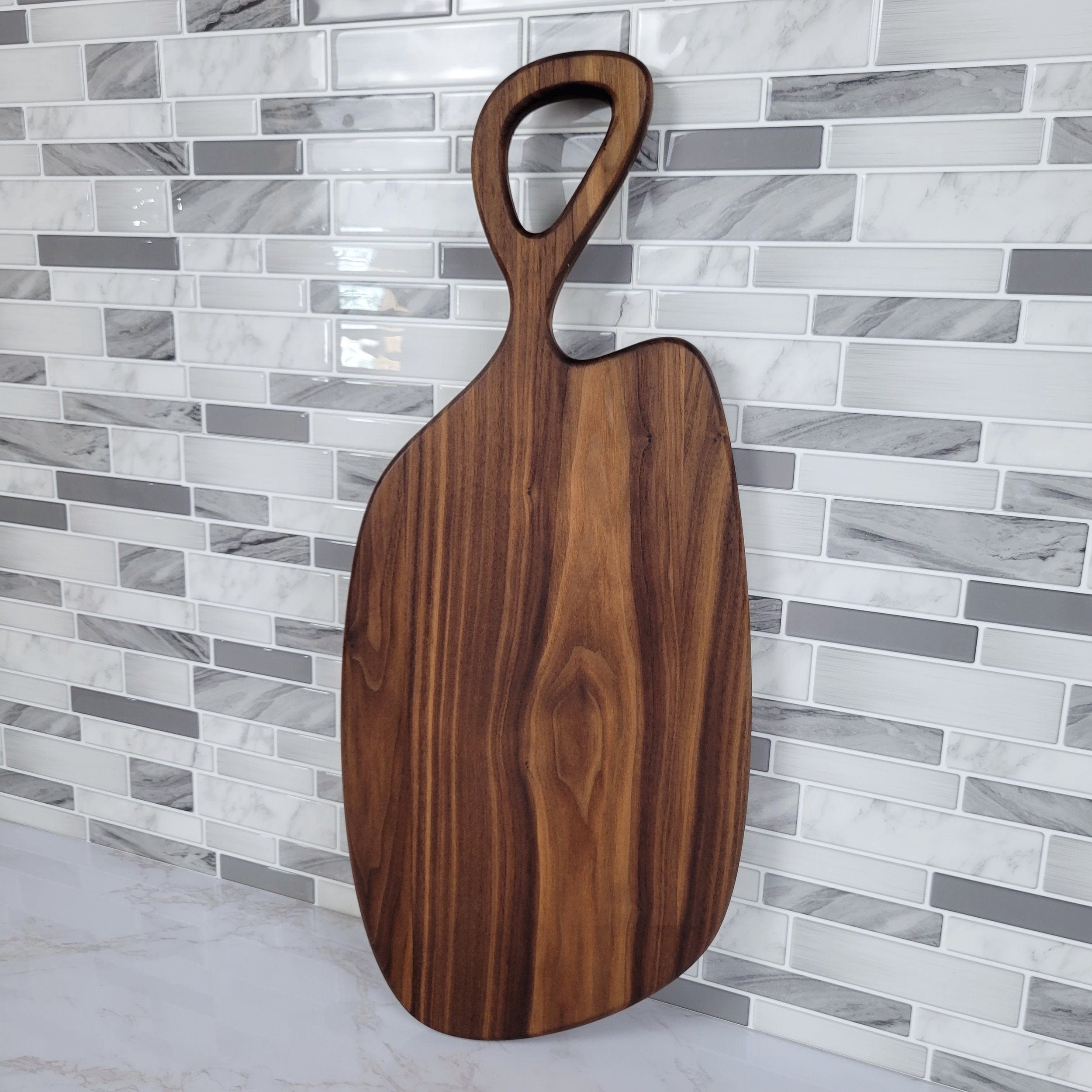 Wood Grain Junkie Black Walnut Charcuterie Board with Organic Curves and Handle