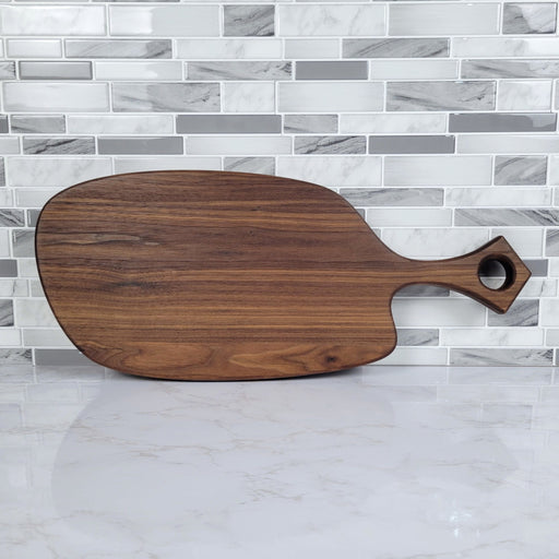 Wood Grain Junkie Black Walnut Charcuterie Board with Organic Curves and Modern Handle