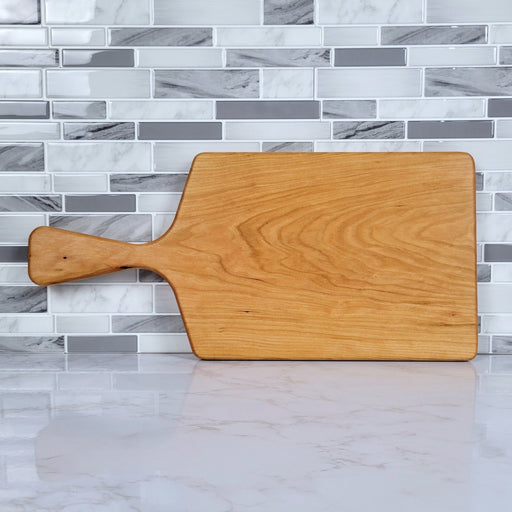 Wood Grain Junkie Cherry Charcuterie Board with a Sleek Modern Handle