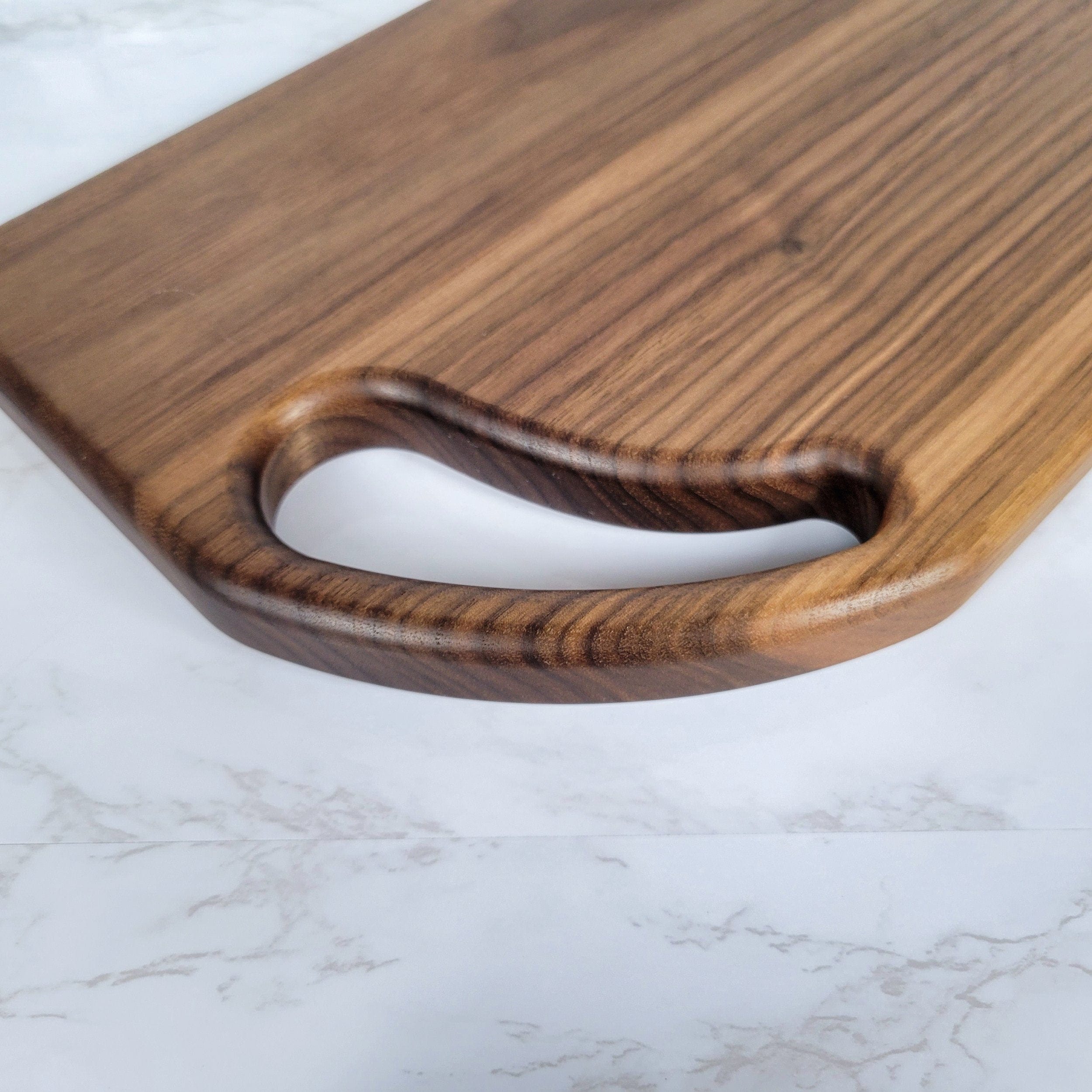 Wood Grain Junkie Curved Corner Handle Black Walnut Cutting Board
